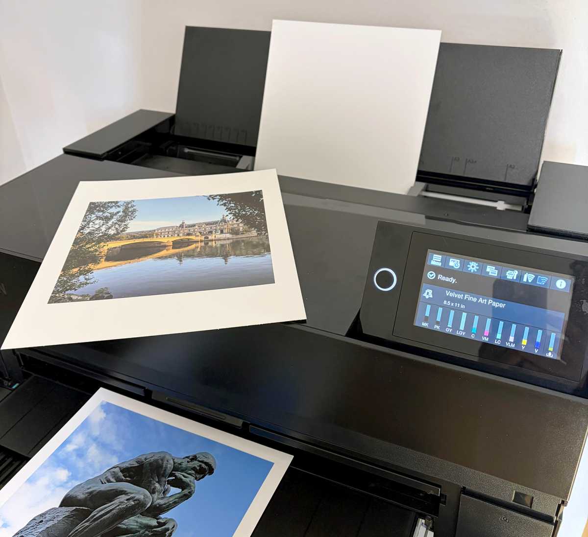 Epson P900 Photo Printer with printed photos of Paris on top