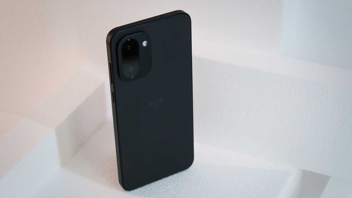 OnePlus 15R review back angled vertical 34 view