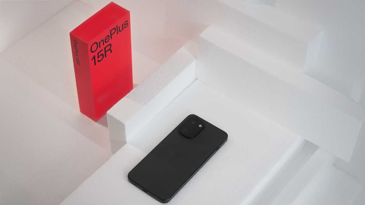 OnePlus 15R review back angled vertical with box