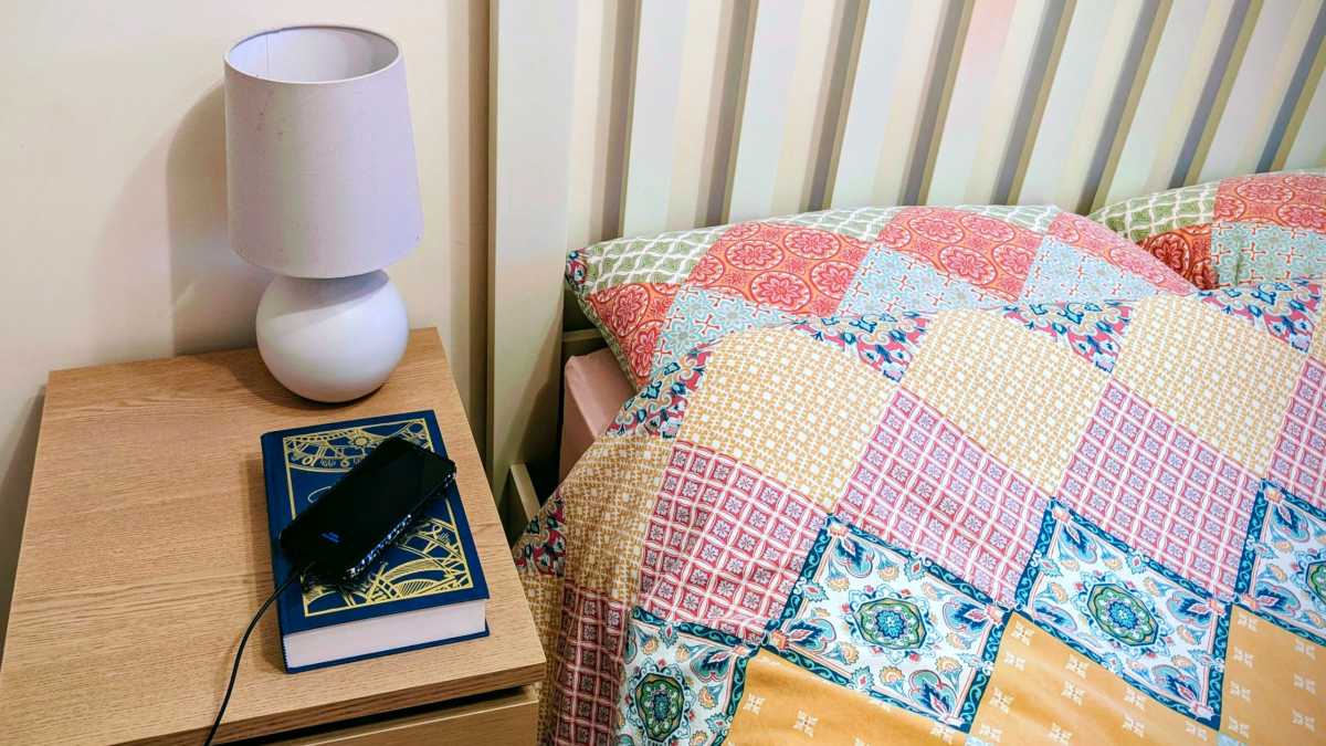 Phone on nightstand next to bed