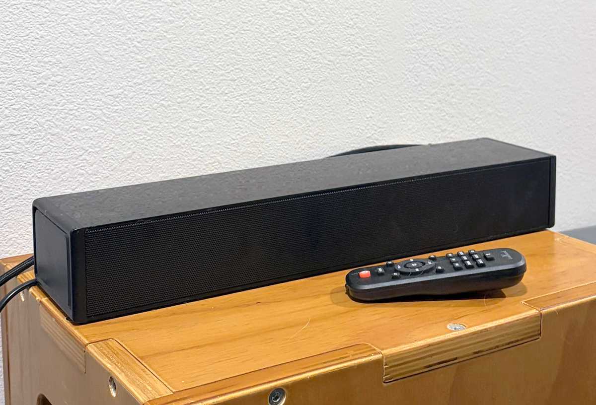Larksound Small Sound Bar sitting on a wooden block