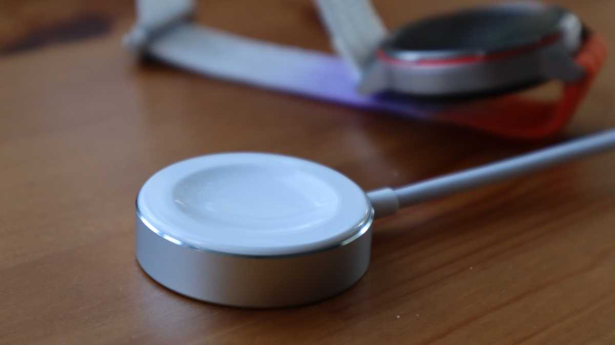 The Huawei Watch GT Runner 2 charging puck