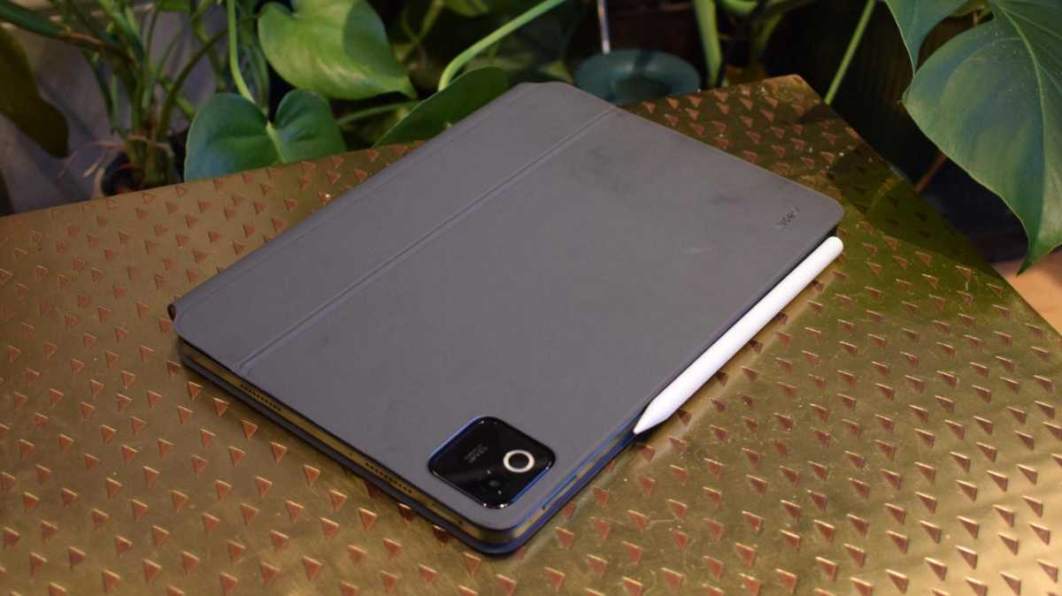 The Xiaomi Pad 8, face down on a table in its folio case.