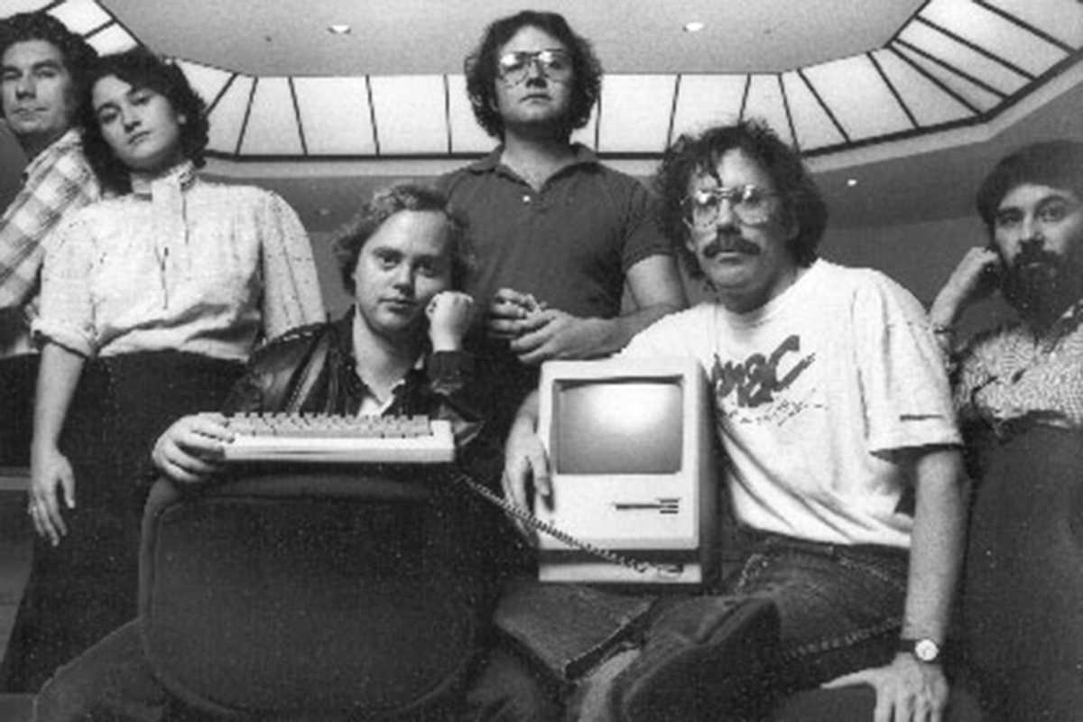 From left to right, it's George Crow, Joanna Hoffman, Burrell Smith, Andy Hertzfeld, Bill Atkinson and Jerry Mannock of the Mac design team.
