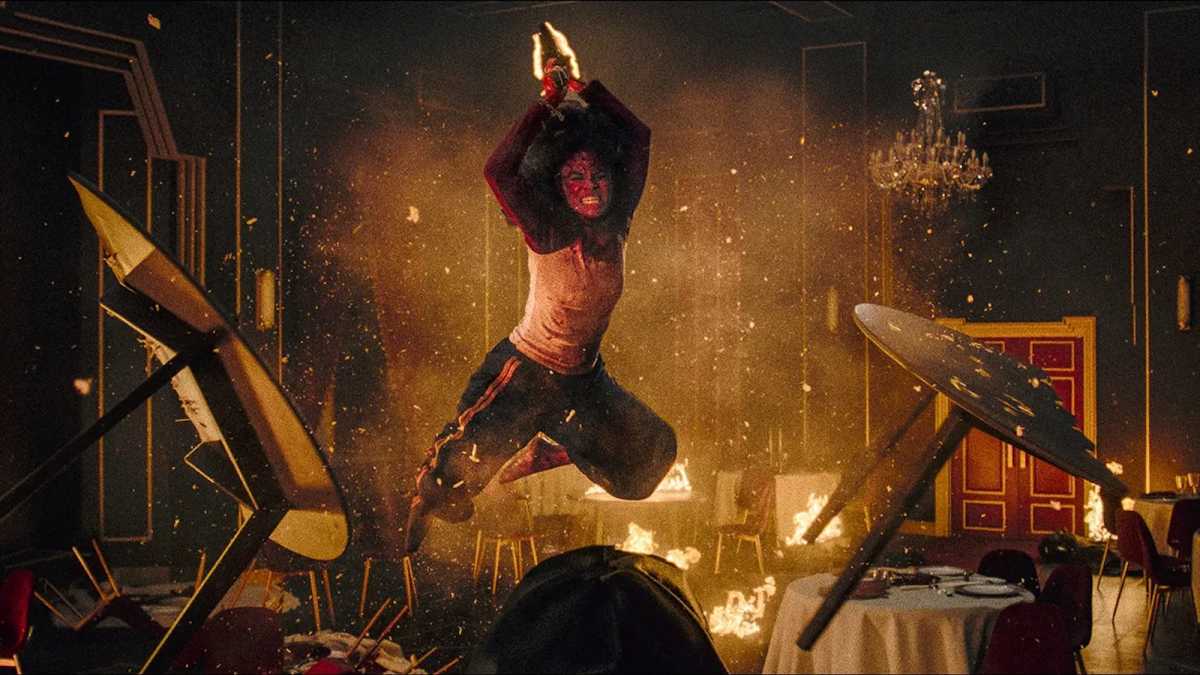 Zazie Beets leaping through the air