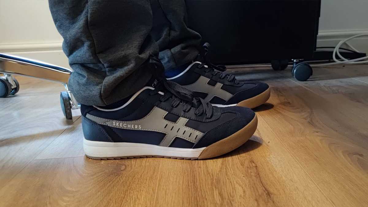 Feet flat on ground while sitting at office desk