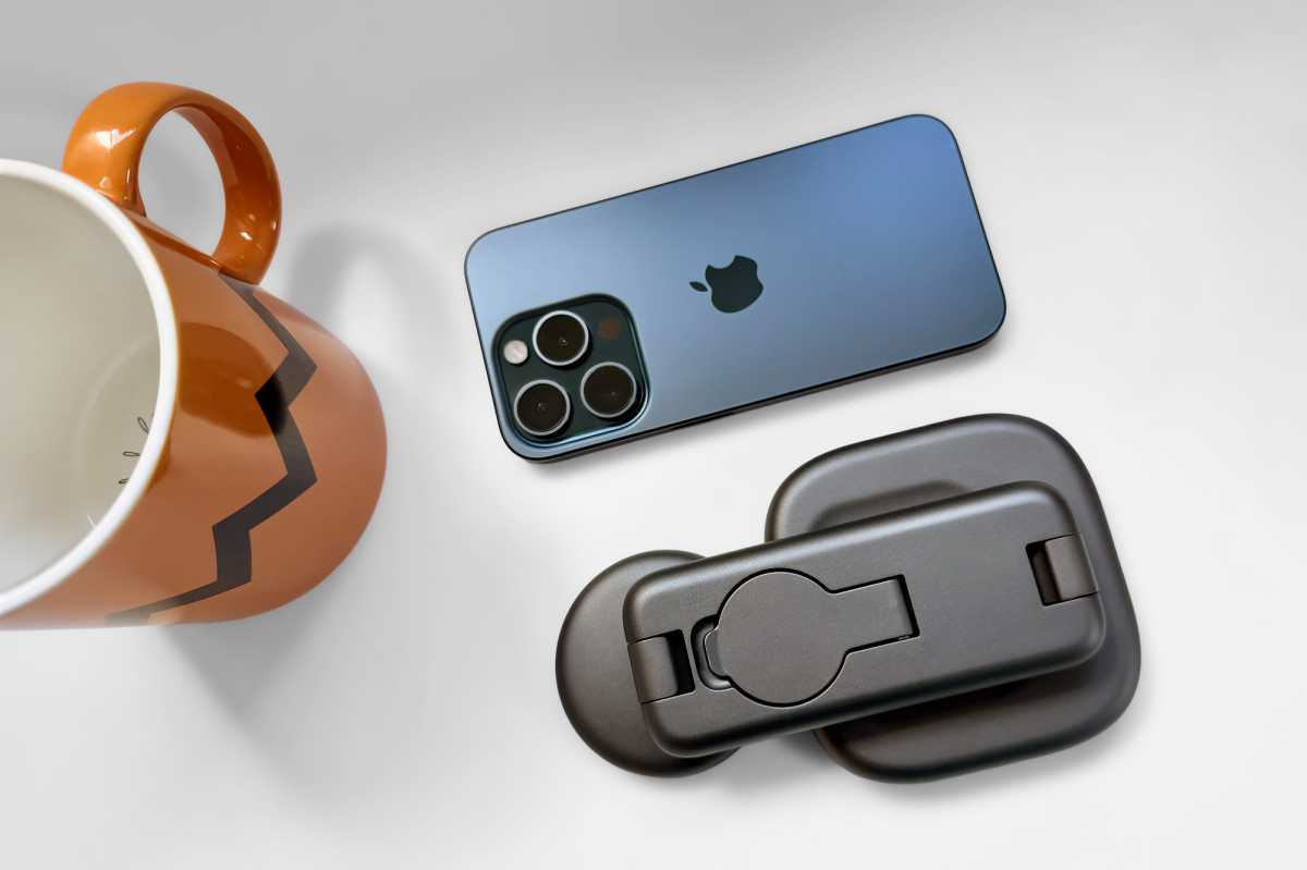 Satechi 3 in 1 Foldable Wireless Charging Stand with Qi2 25W folded with iPhone