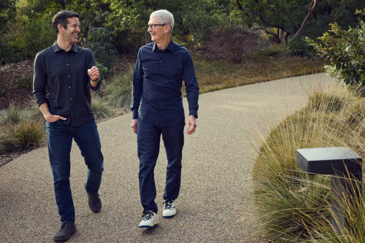 Time Cook and John Ternus walking at Apple Park