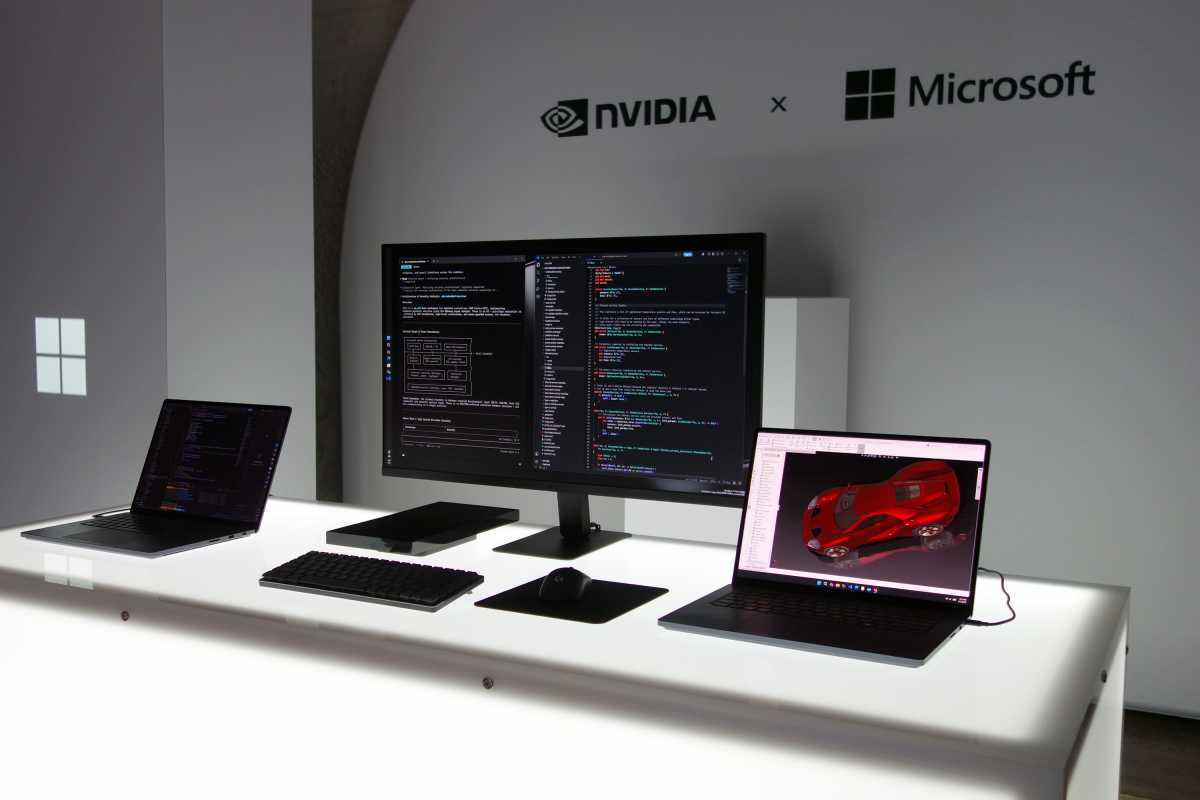 Surface Laptop Ultras flanking a Surface RTX Spark Dev Box