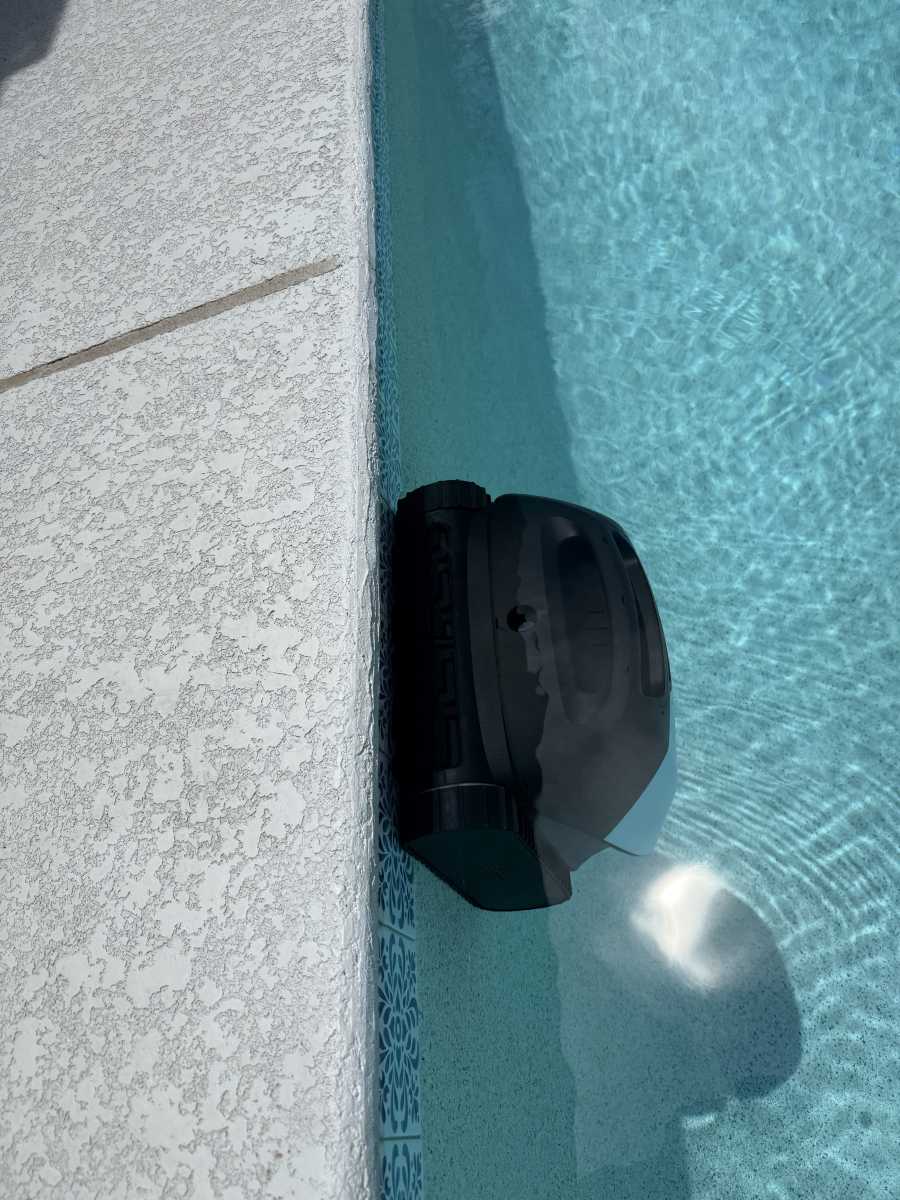 Beatbot Sora 10 on the side of pool