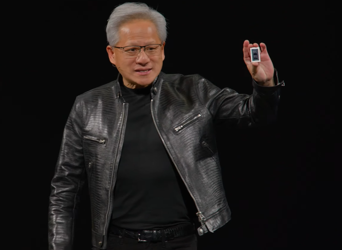 Nvidia Jensen Huang holds up RTX Spark chip