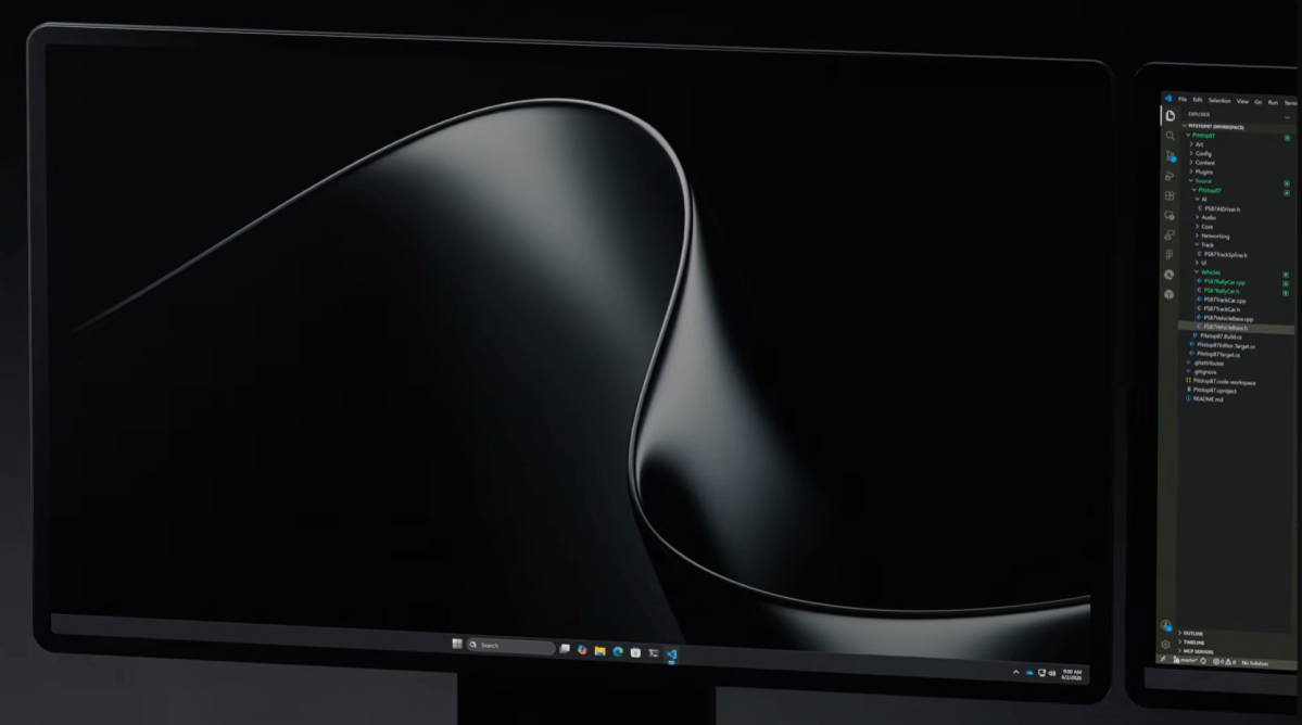 A Windows desktop showing a black and grey swirl wallpaper image.