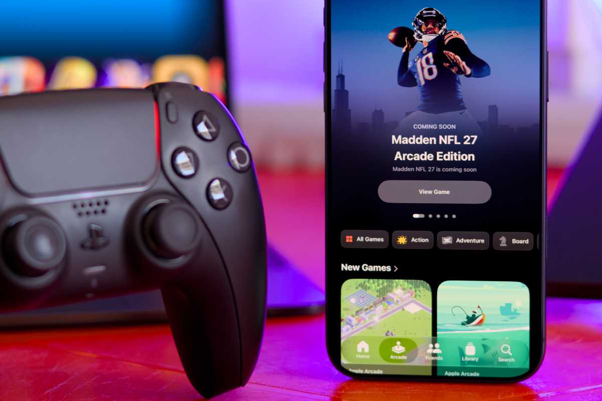 Sony DualSense Controller next to Apple Games on iPhone