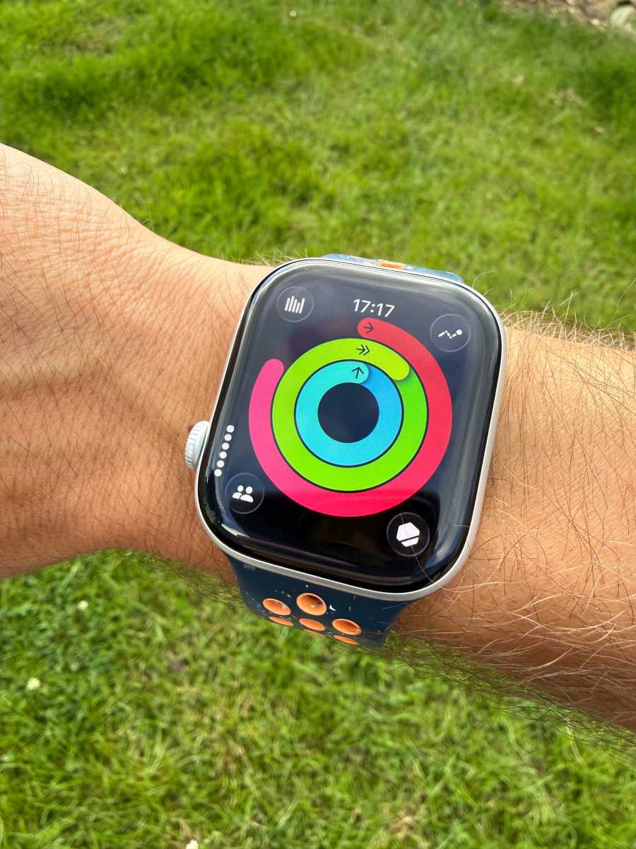 Workout app's activity rings shown on an apple watch worn on a wrost