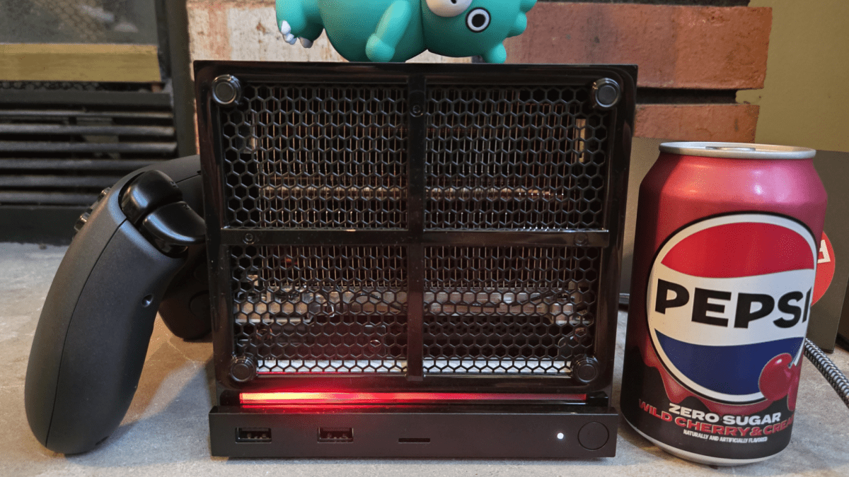 Steam Machine with its cover off, and soda can