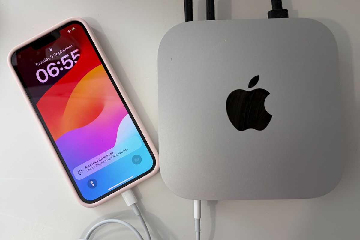 iPhone plugged into Mac