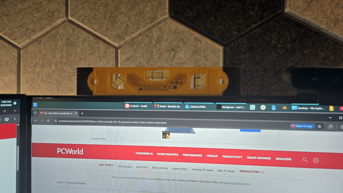 Bubble level on top of a monitor