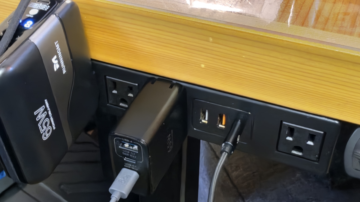 Power strip underneath desk