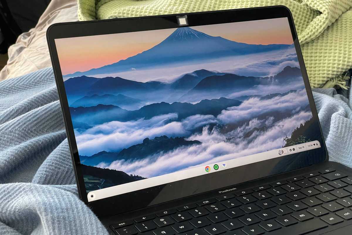 Chromebook with its webcam taped over