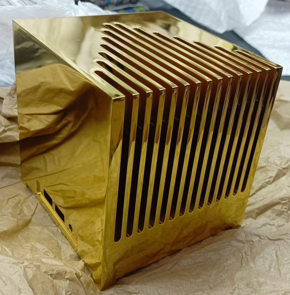 Kubb Fanless PC made out of gold