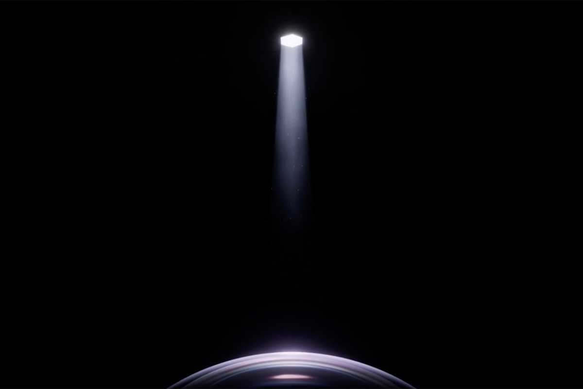 image of a beam of light shining on a camera lens as tweeted by John Ternus