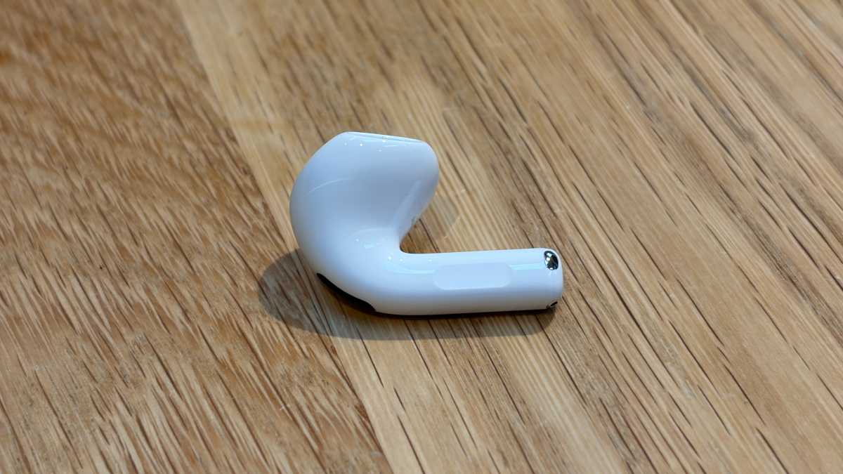 AirPods 5 single right bud showing force sensor with volume swipe