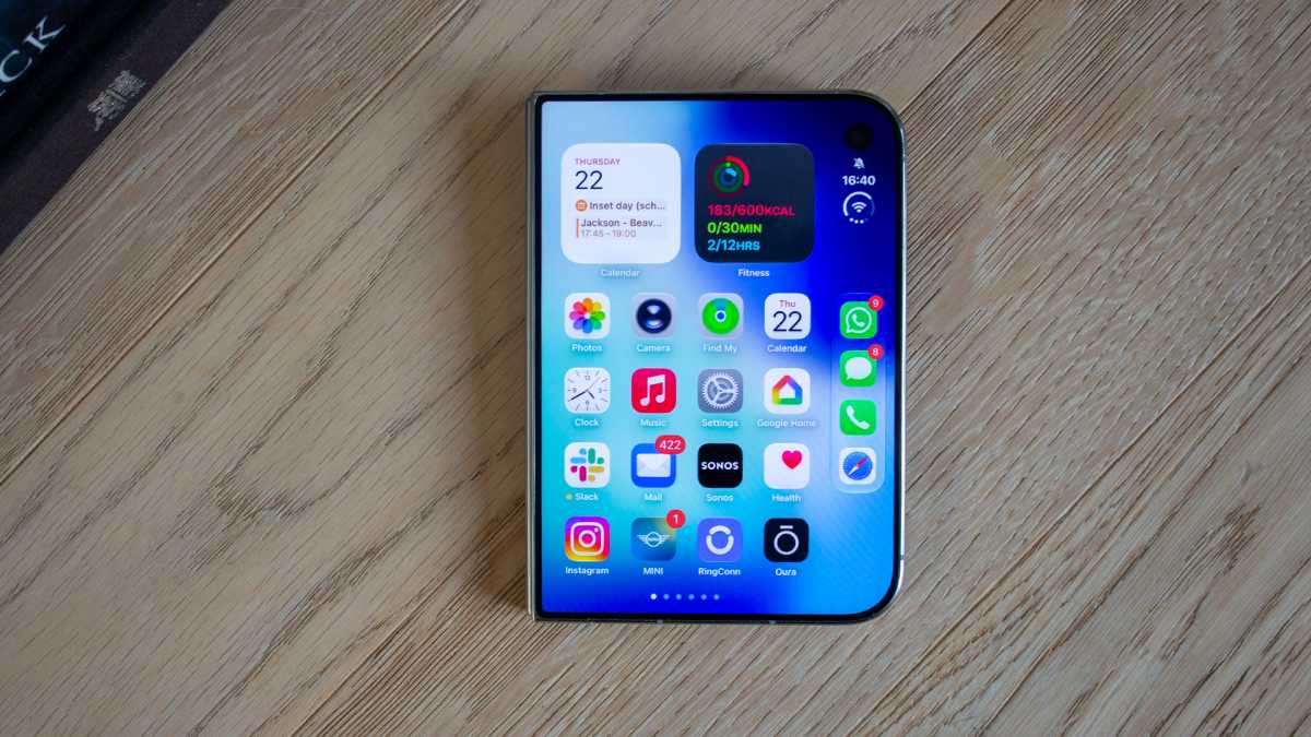 iPhone Duo closed on a table showing the Home Screen