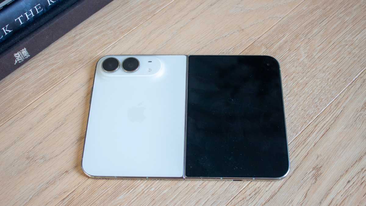 iPhone Duo open on a table lying face down with the cover screen off