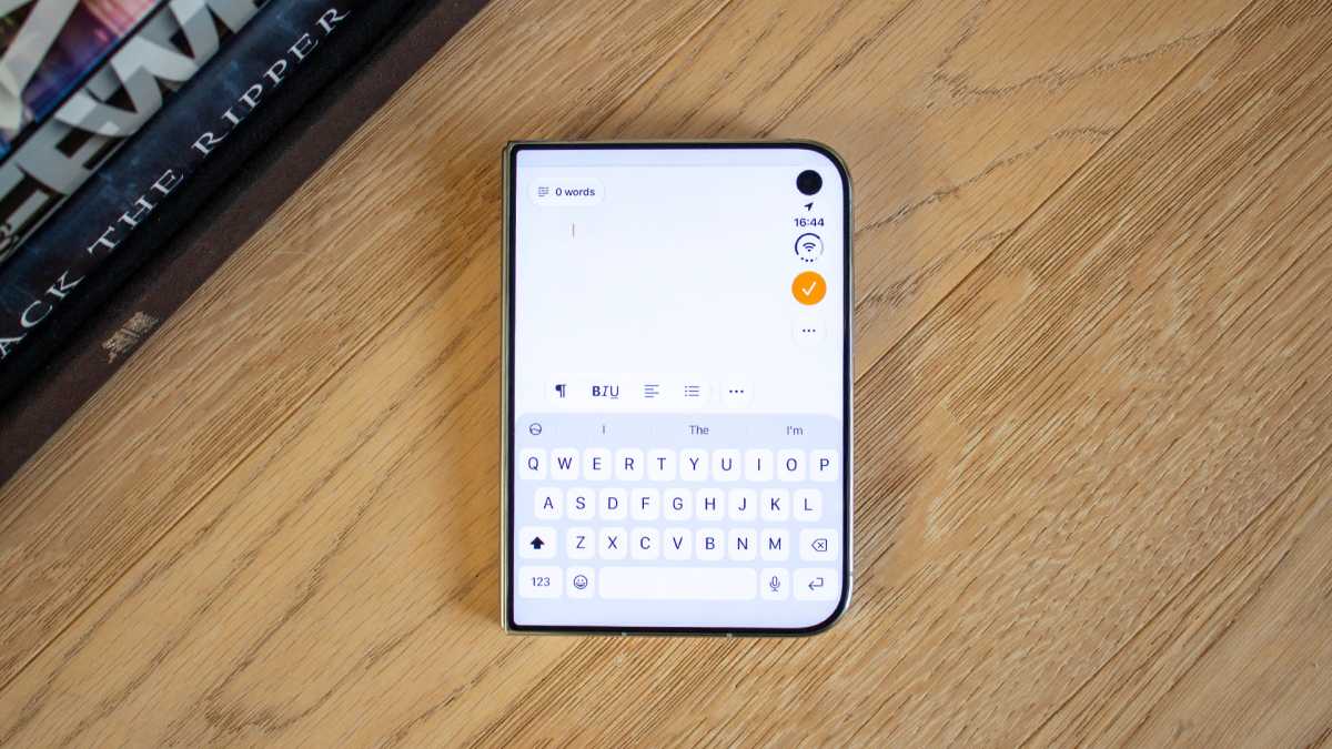 iphone duo closed with an empty pages document showing