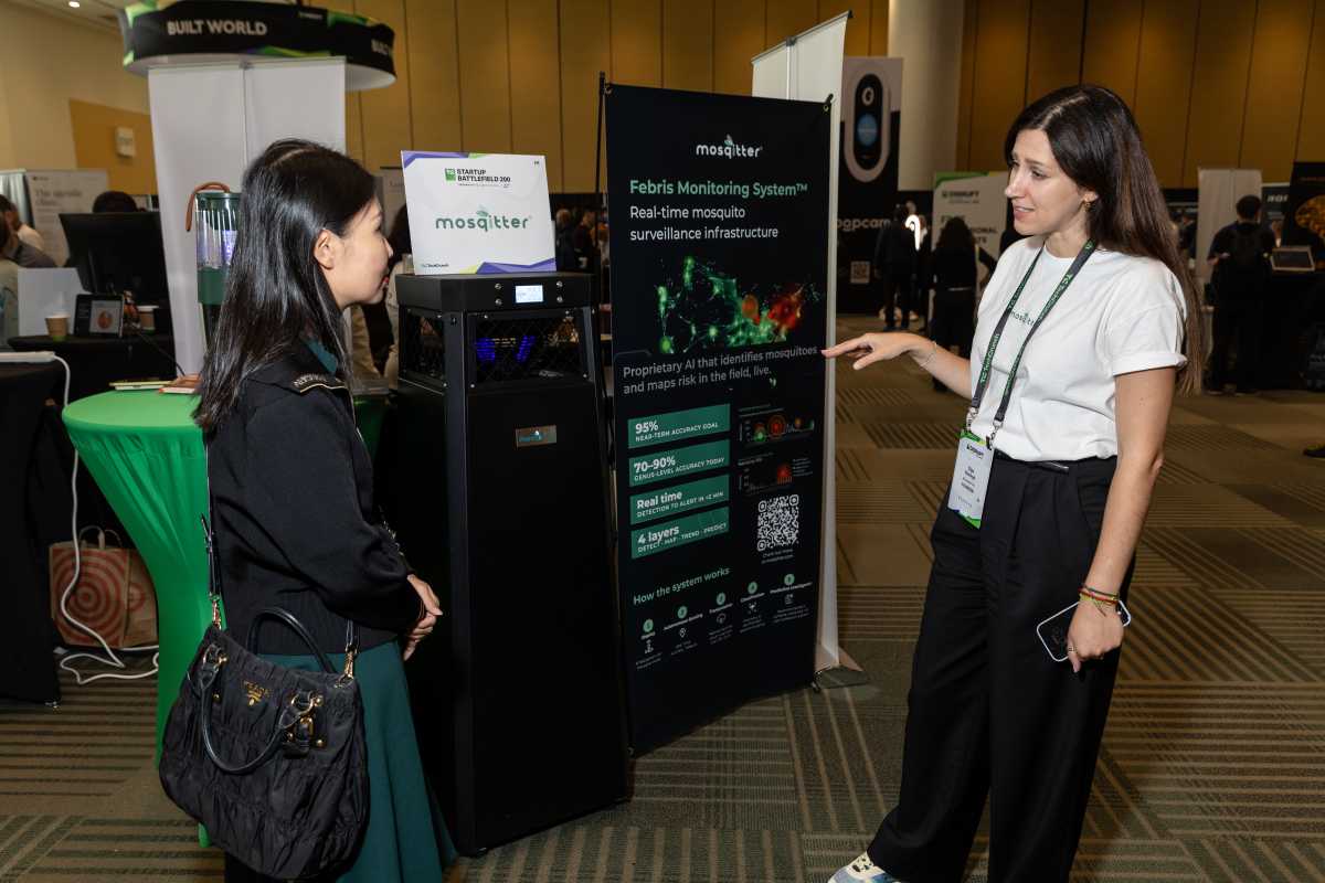 Olga Diachuck, Mosqitter co-founder, explains the system to a Disrupt attendee.