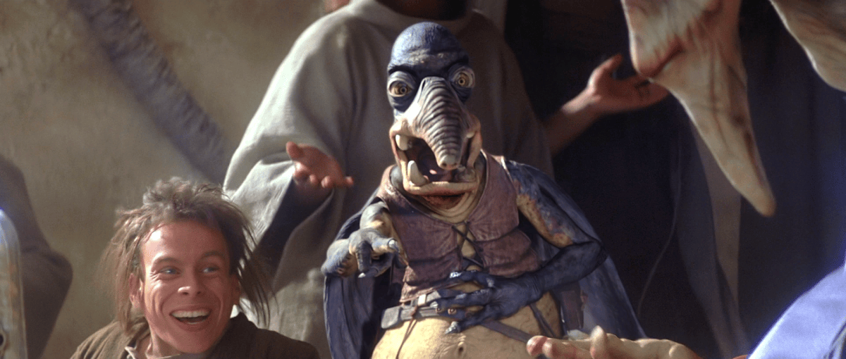 Still from Episode 1 featuring Watto and Warwick Davis.